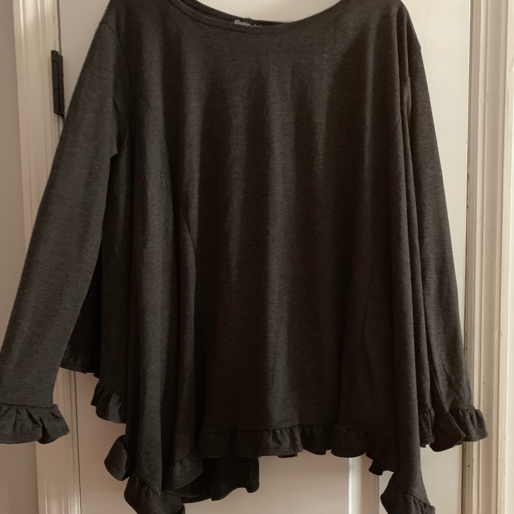 Scoop neck ruffle tunic cape.